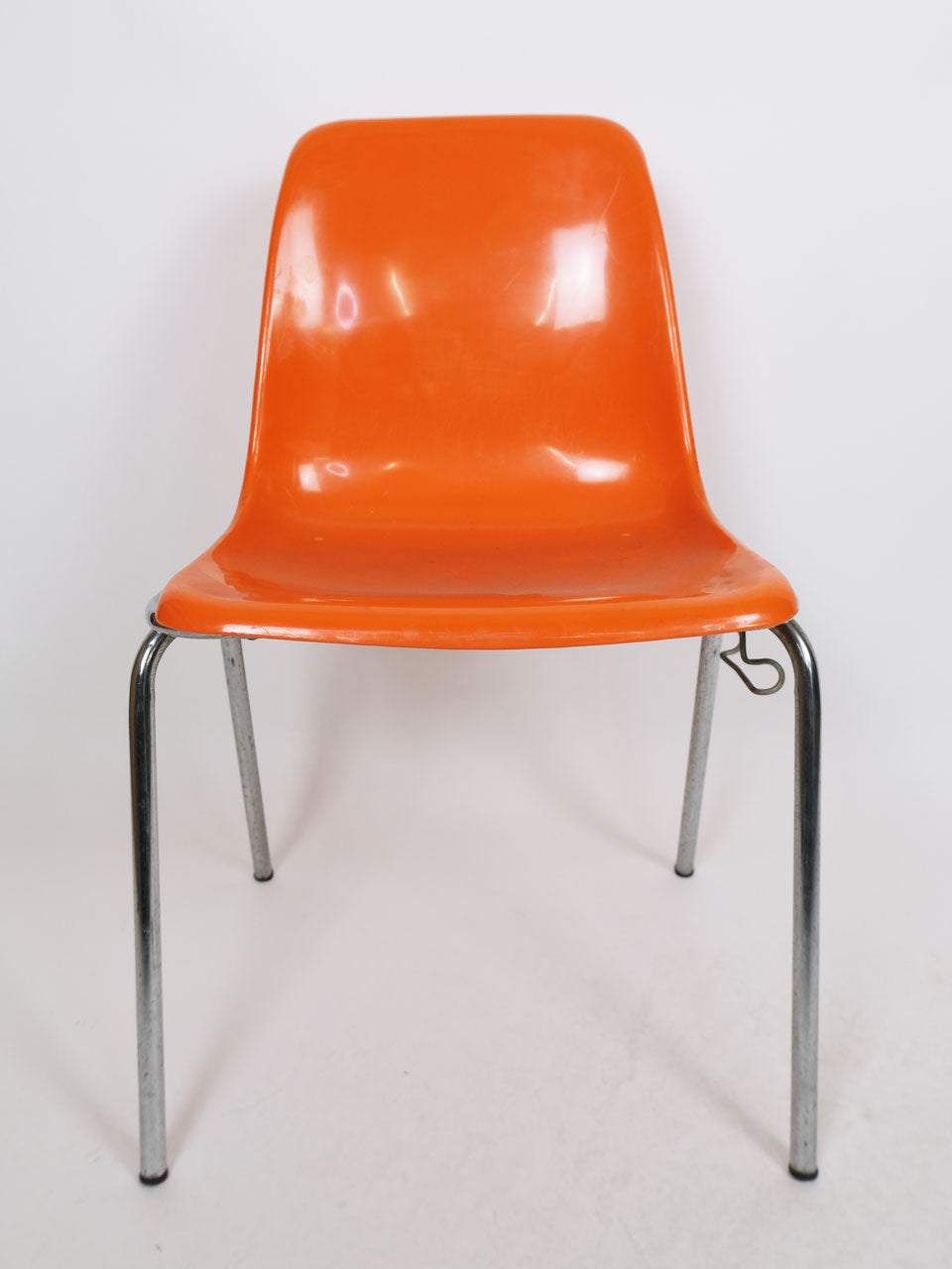 Orange plastic chair