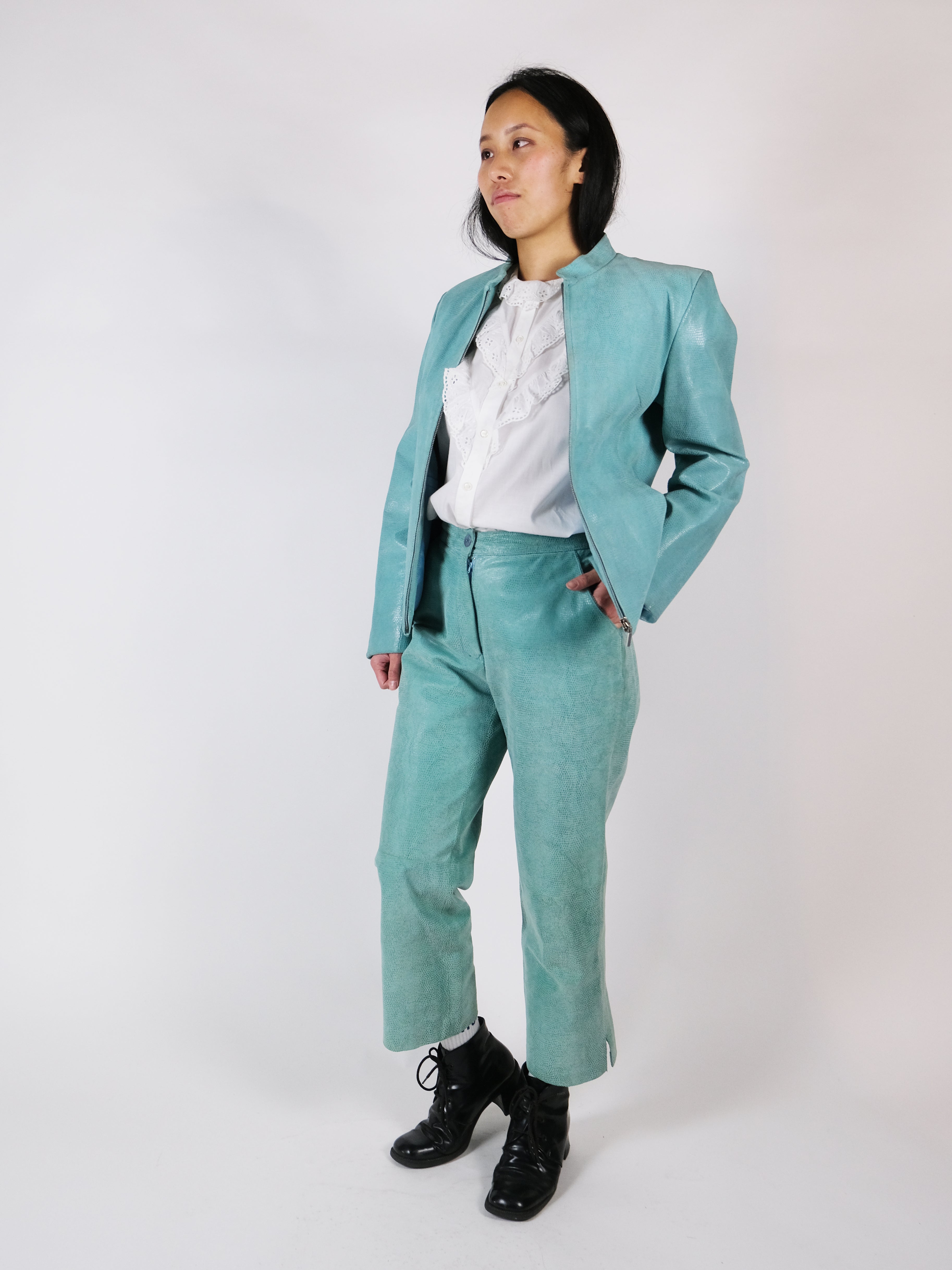 Turquoise leather suit