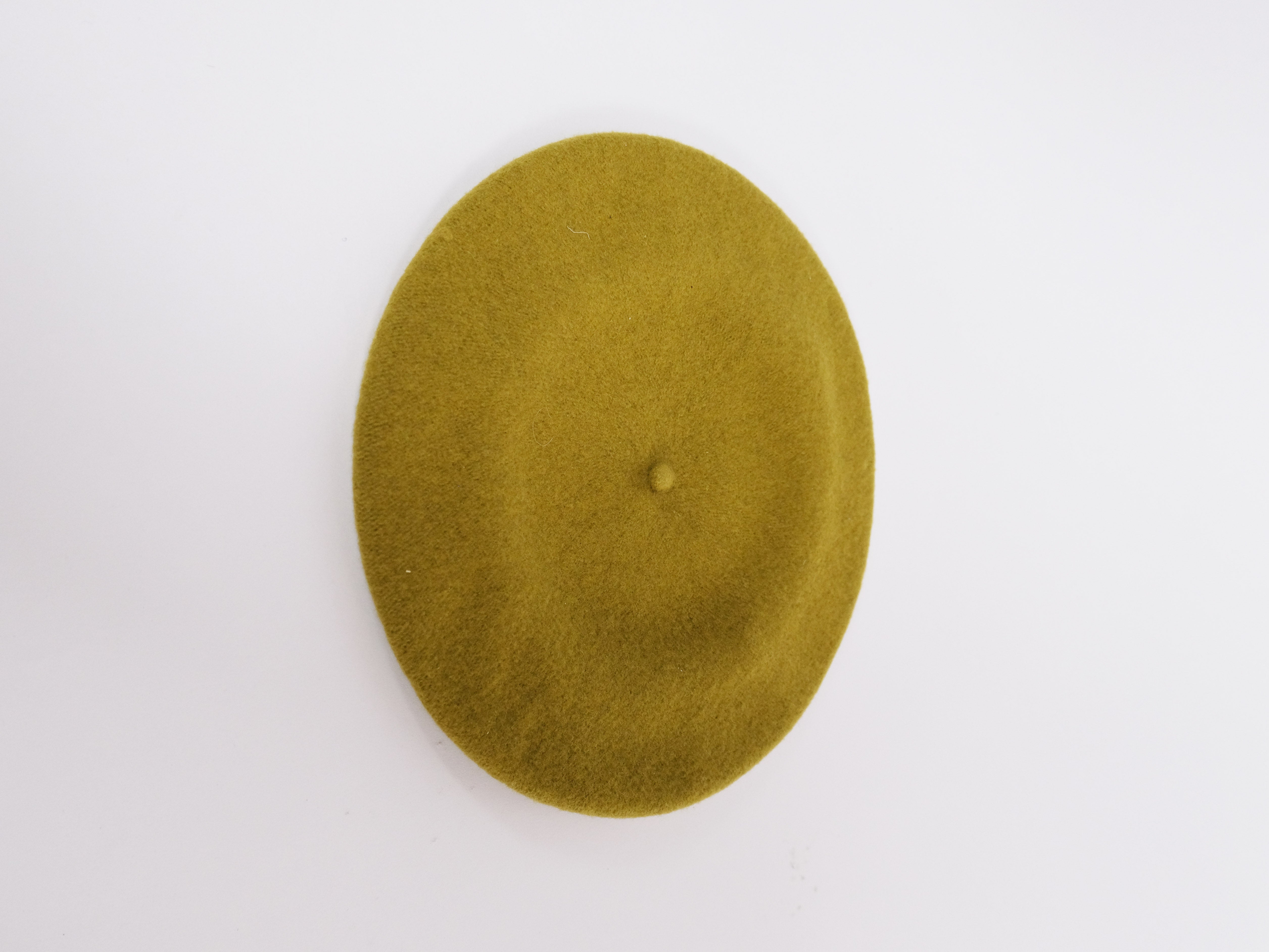 Mustard colored beret